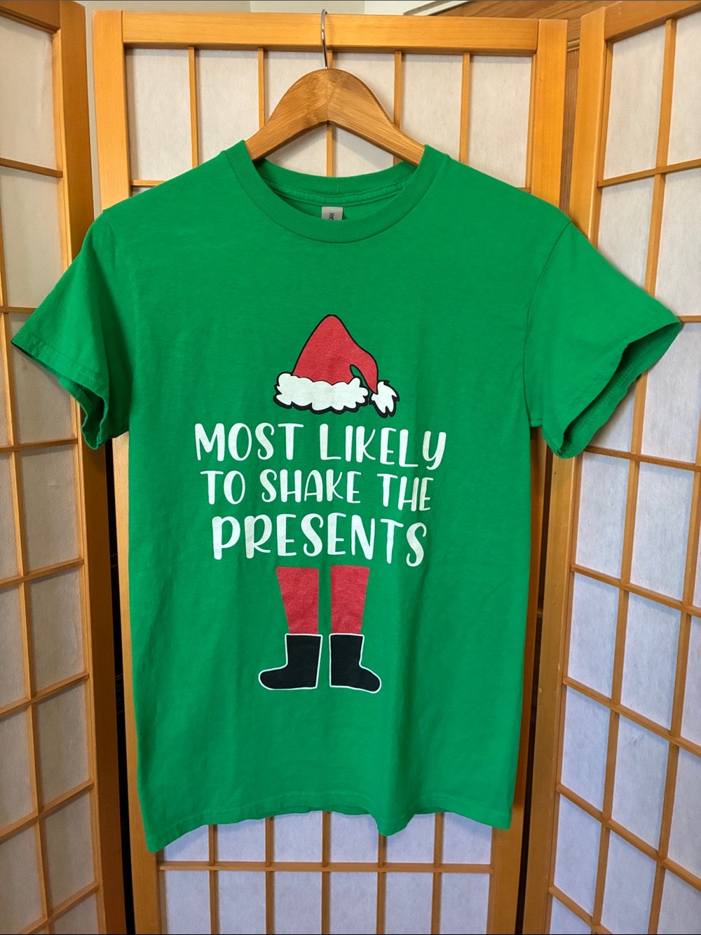 Green Holiday Tee with Red Santa Hat Graphic